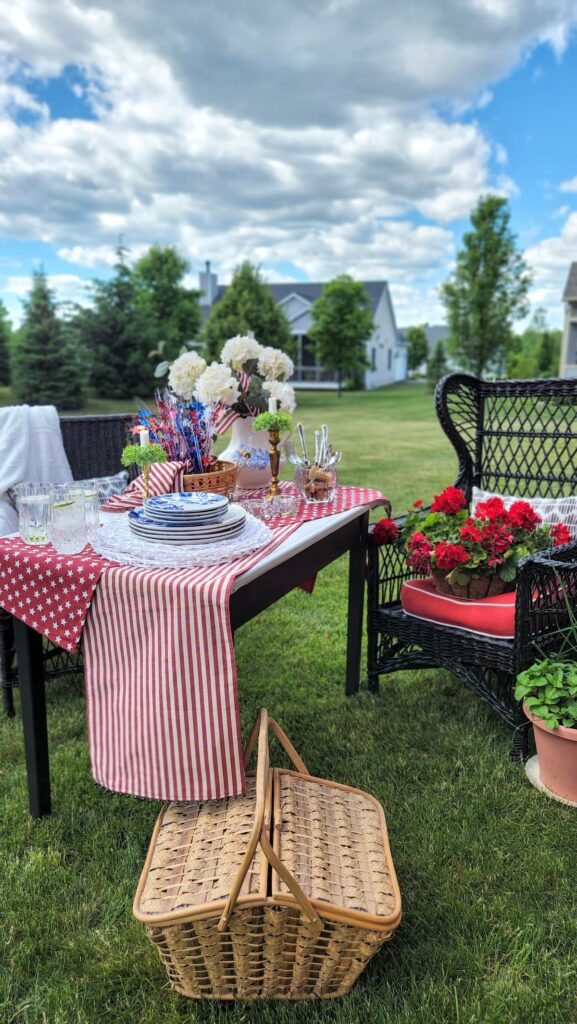 outdoor table decorated with red and white and blue for memorial day