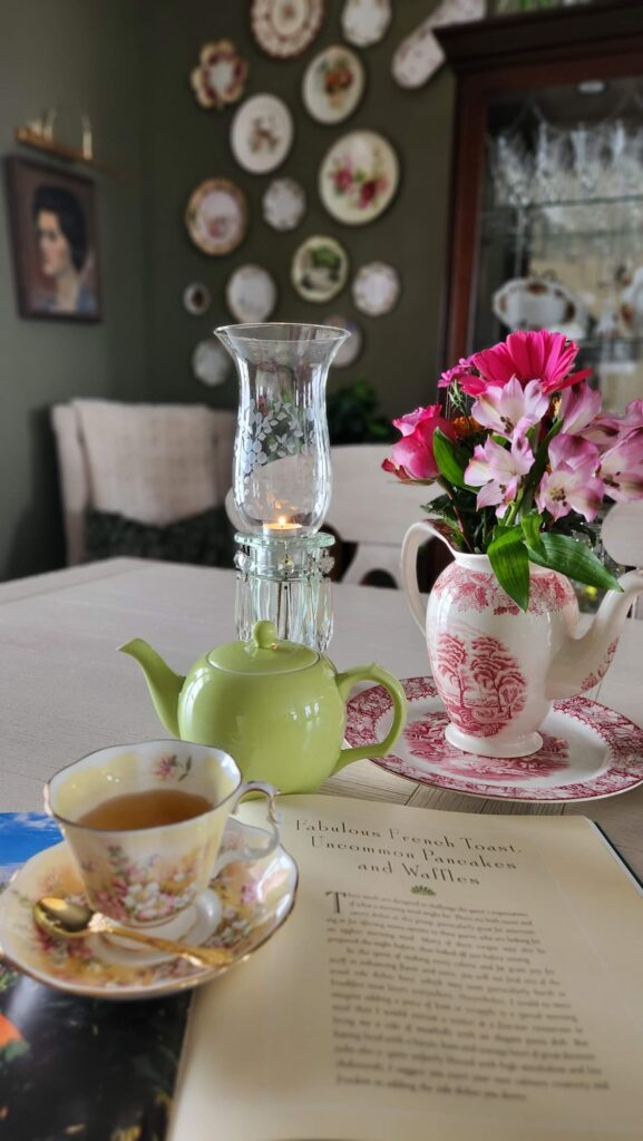 small vase with flowers on dining room table