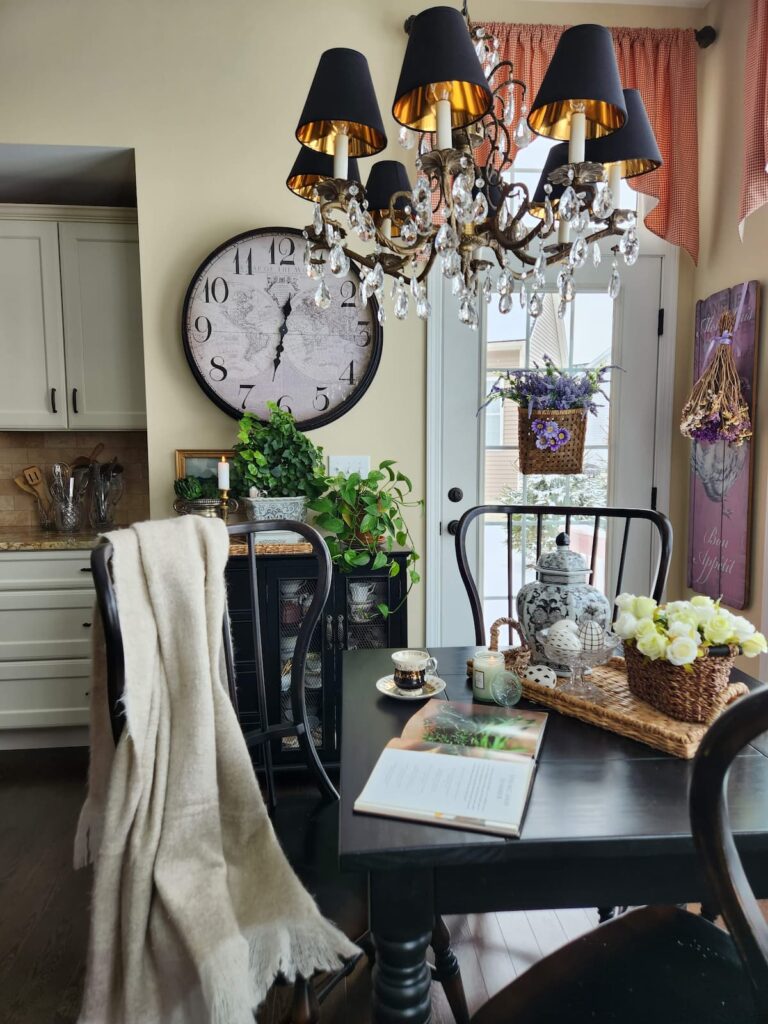 breakfast room table with wicker tray and flowers on it