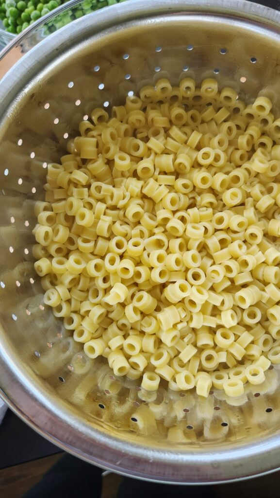 cooked ring pasta drained in collander