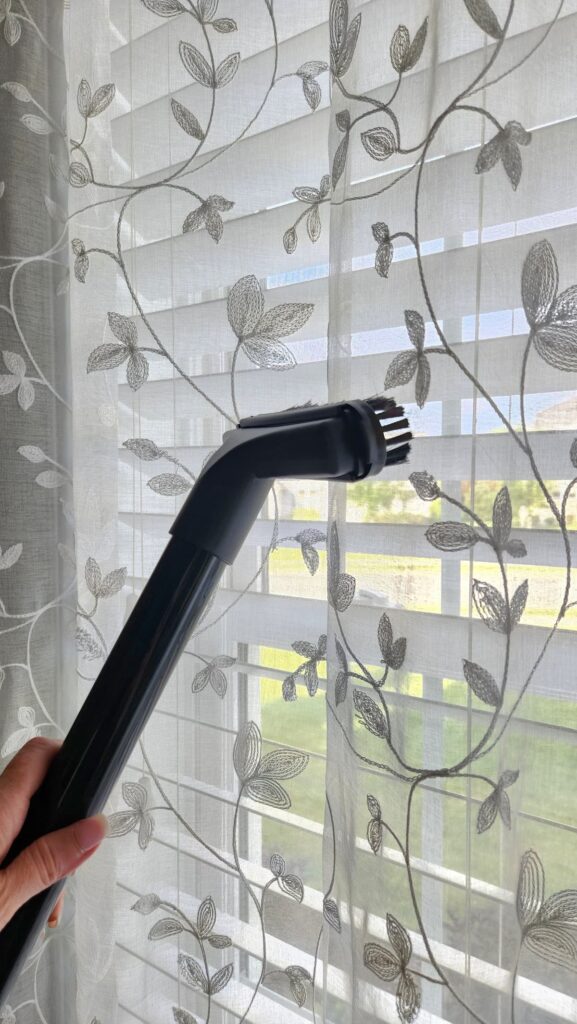 upholstery brush vacuuming sheer curtains