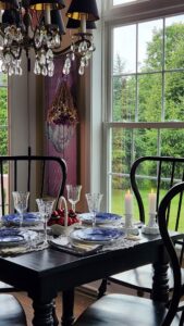 view of breakfast room with blue and white dishes on table