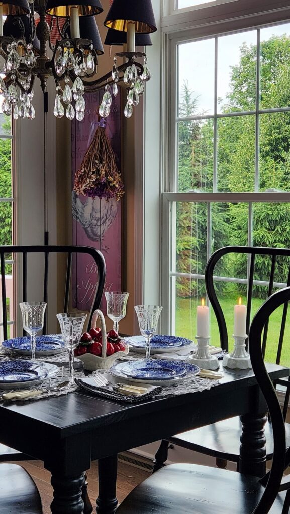 view of breakfast room with blue and white dishes on table