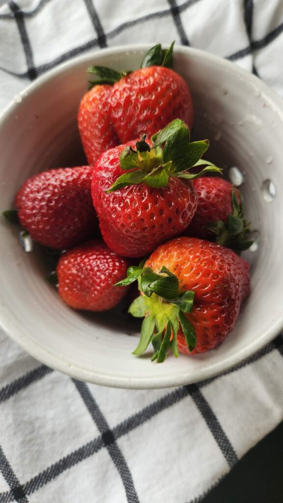 strawberries in a pottery bowl made just for berries