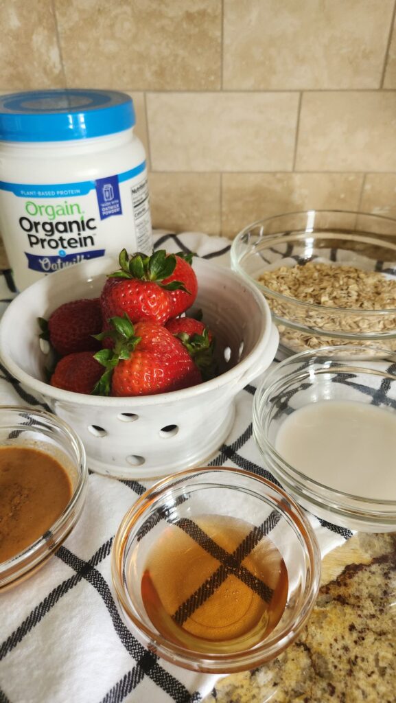 glass bowls with ingredients for strawberry protein bar recipe