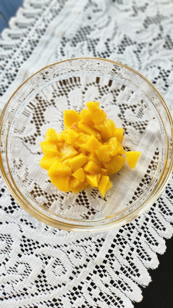 diced nectarines in a glass mixing bowl