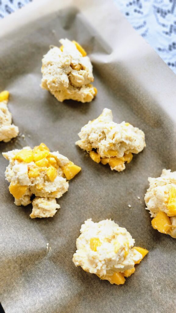 biscuits on parchment paper ready to bake