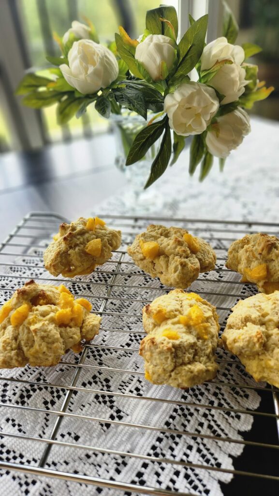 baked shortcake biscuits on wired rack cooling