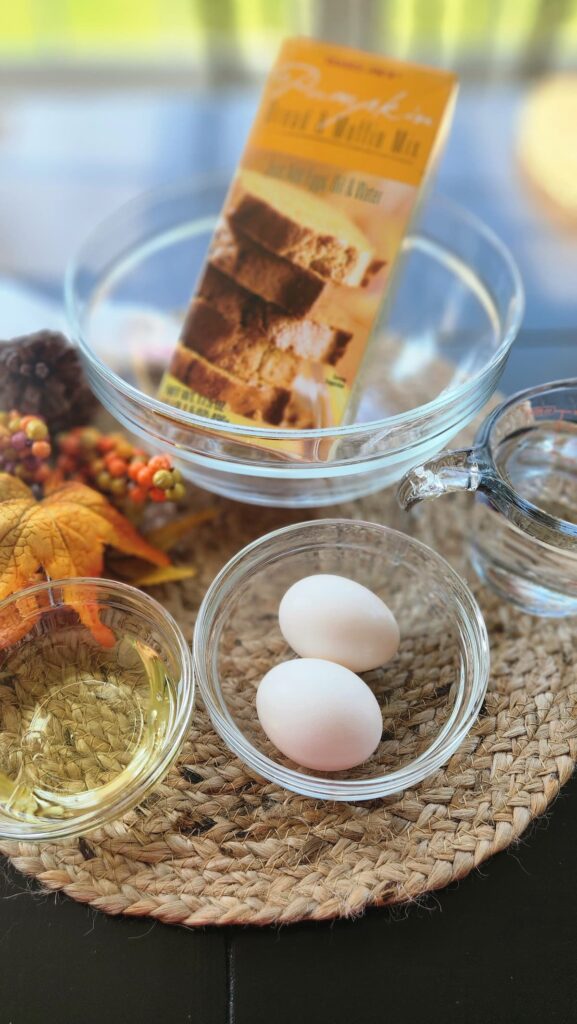 box pumpkin bread mix with other ingredients on table