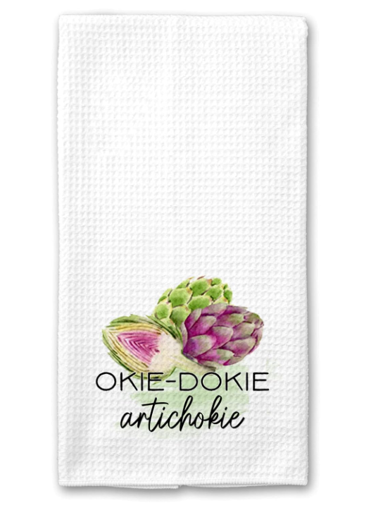 white waffle weave dish towel with artichokes on it