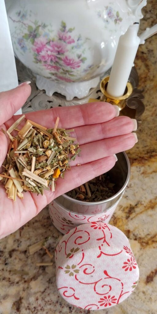 hand full of ginger zen tea 