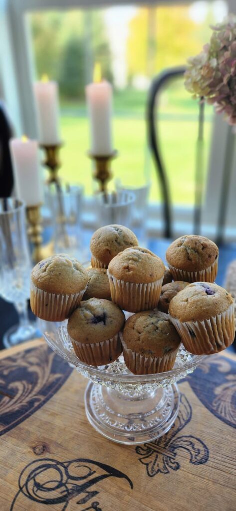 crystal vintage pedestal dish with mini blueberry muffins piled on top