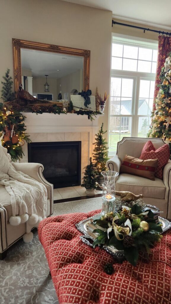 view of living room with mantel decorated in background and small christmas trees in front of mantel