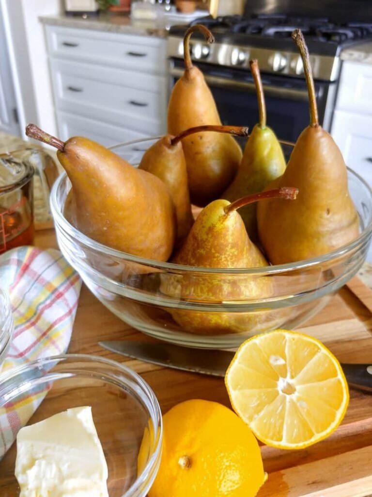 glass bowl filled with pears