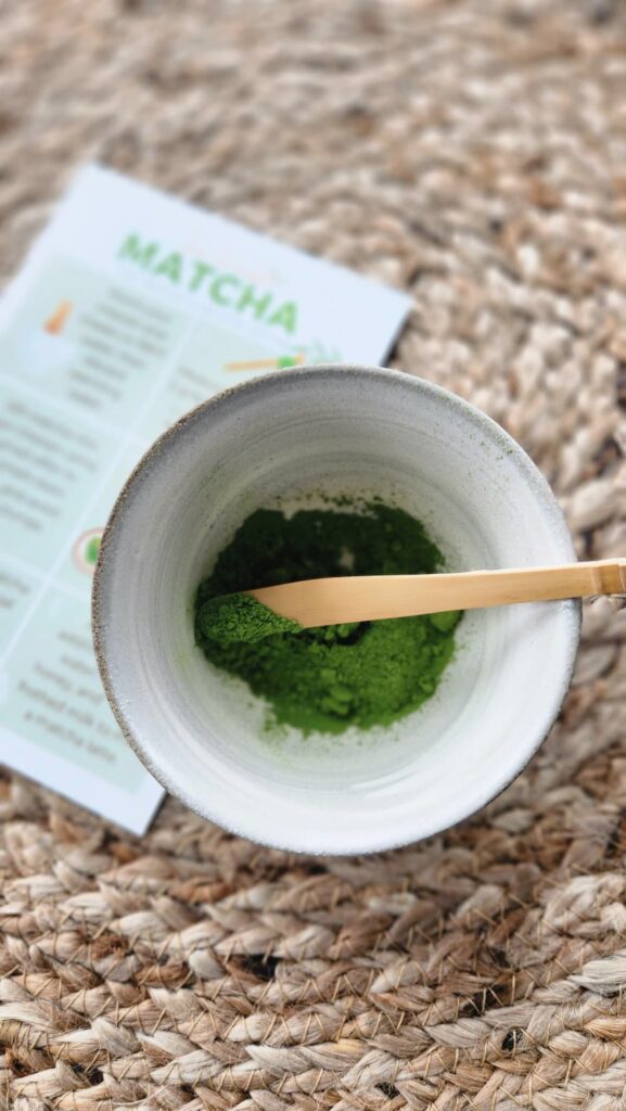 matcha with scoop in a small bowl