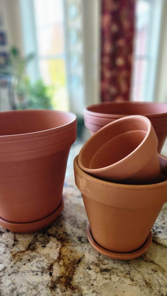 clay terra cotta pots on kitchen counter