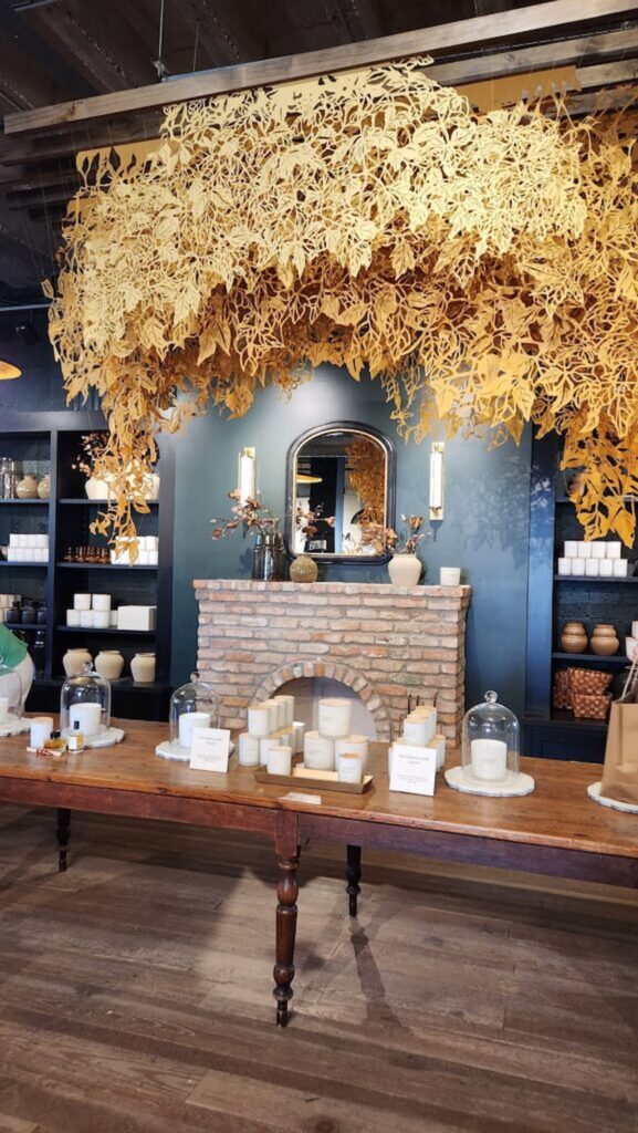 leaf decoration hanging from rafters at Magnolia in Waco texax