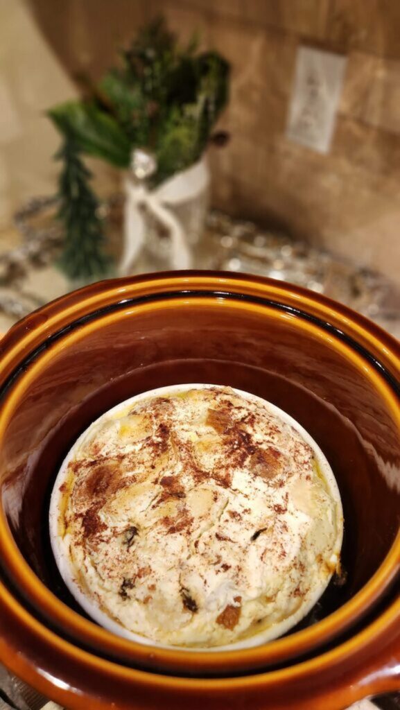 overhead view of ricotta bread pudding recipe in crockpot