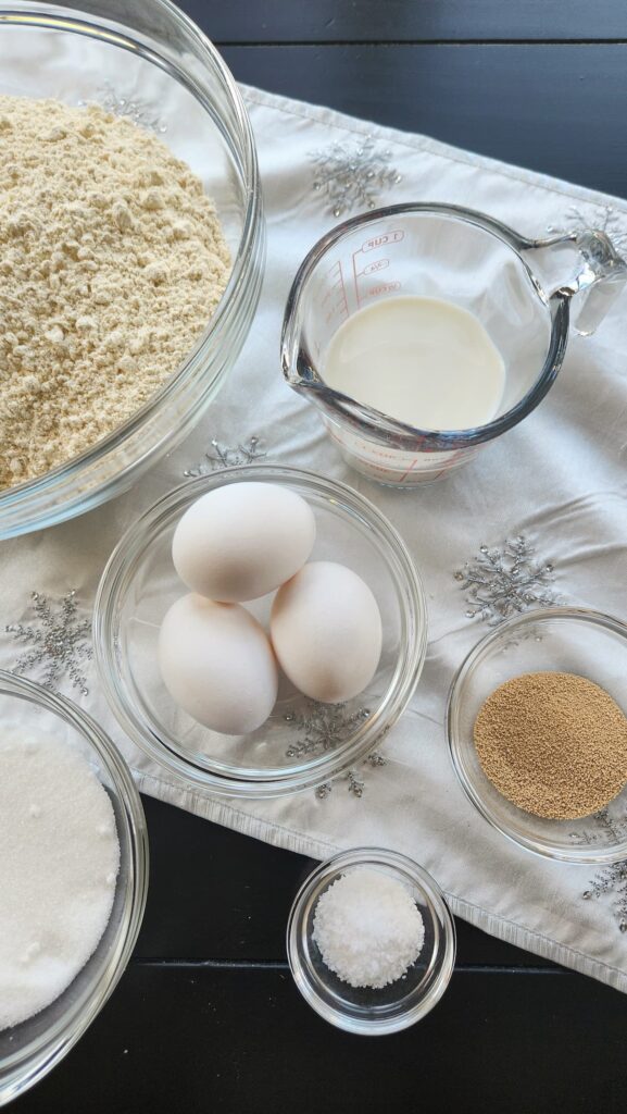 ingredients on table for panettone, flour, milk, sugar, 