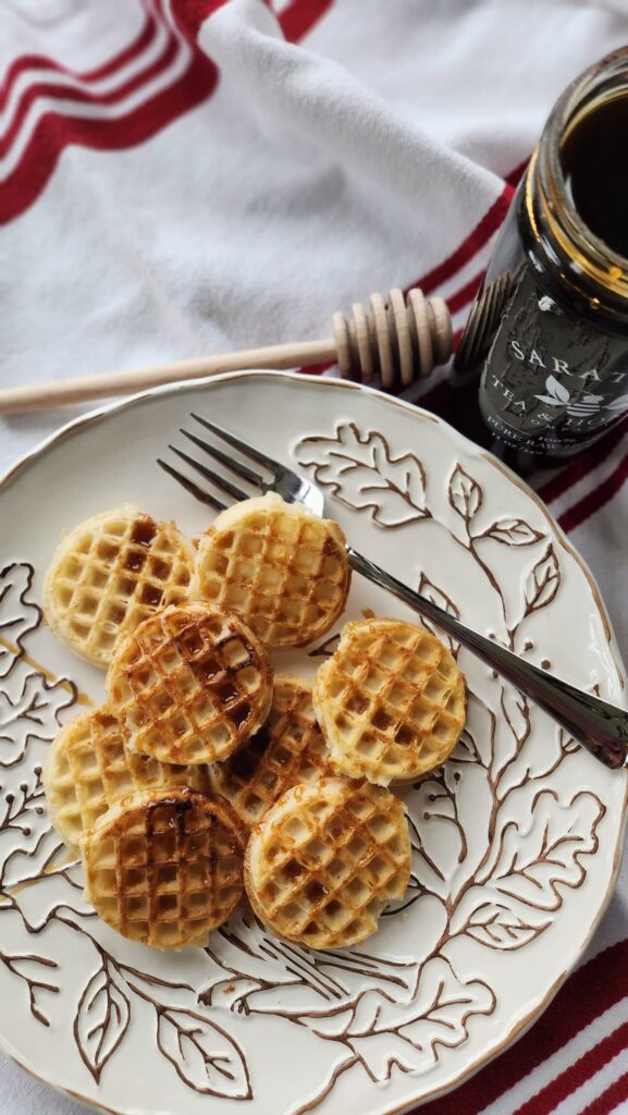 mini waffles with buckwheat honey drizzled on top