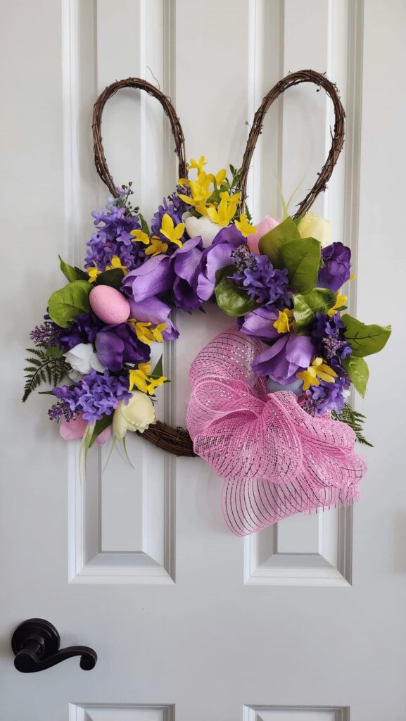 bunny wreath with flowers on door