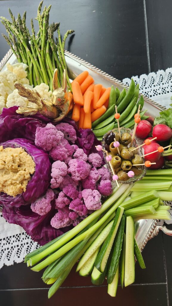 easter veggie tray with colorful vegetables on silver tray