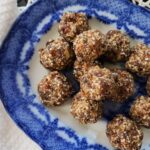 flax seed balls on a blue and white dish