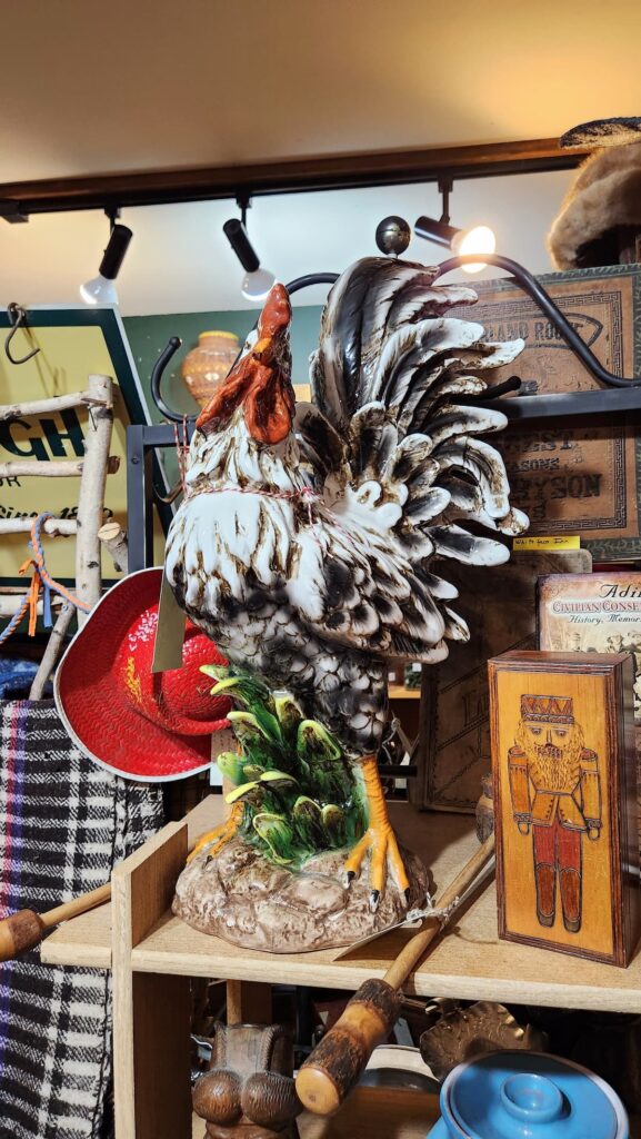 very large vintage rooster in a thrift shop