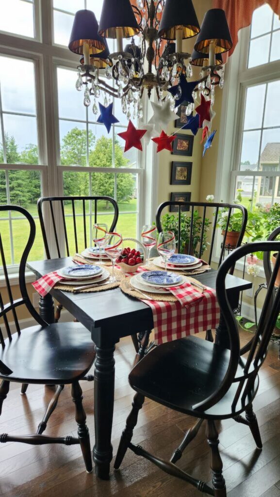 red white and blue velvet stars banner hanging from crystal chandelier