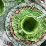 layered cabbage ware dishes on brown calico plate