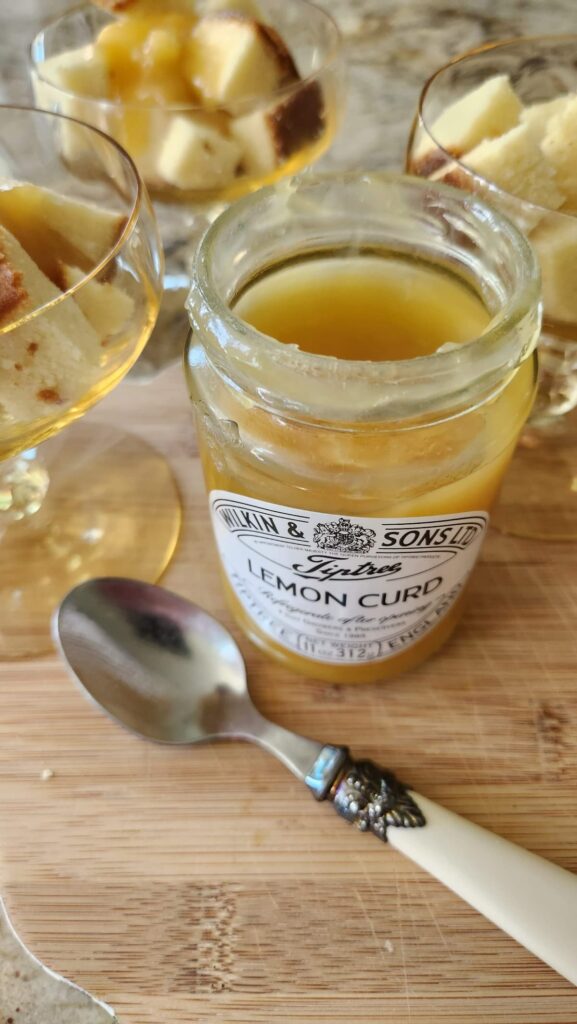 jar nof lemon curd with spoon