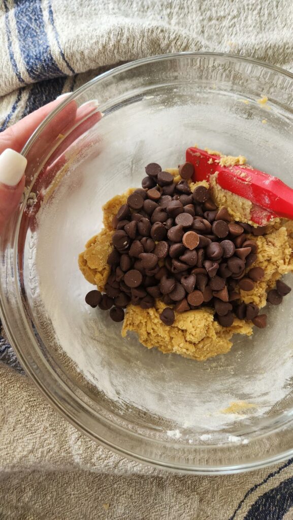 chocolate chips being added