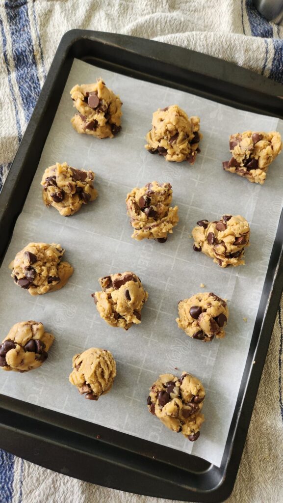 cookie dough on parchment paper and baking dish