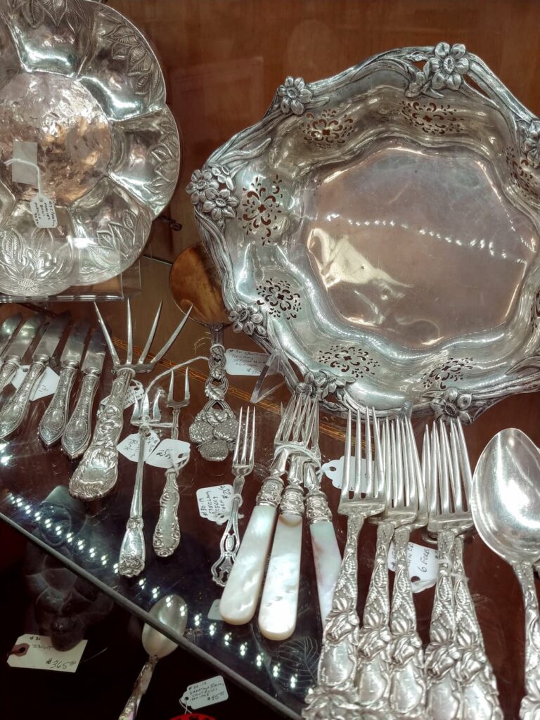 silver flatware pieces on a table