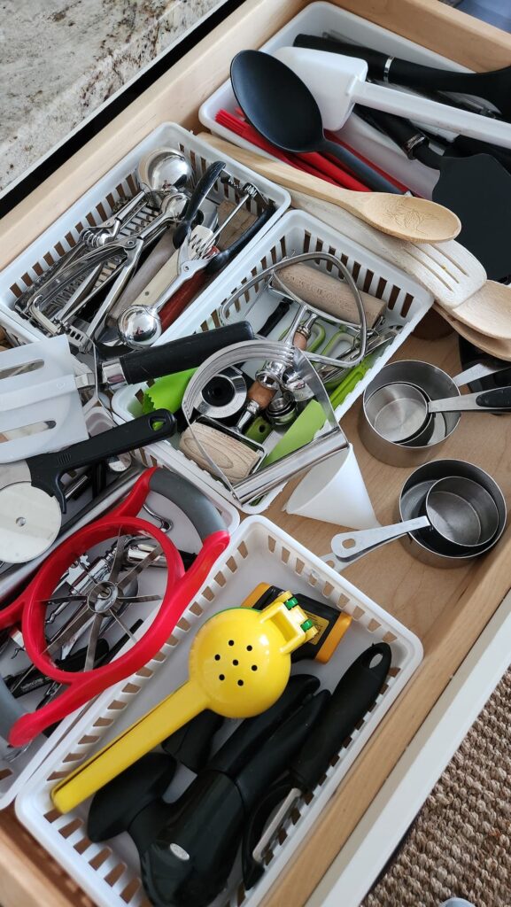 kitchen utensil drawer before cleaning
