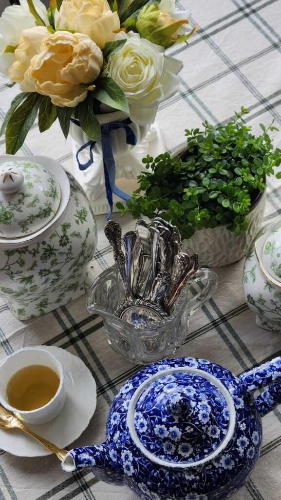 overhead photo of tea jars and tea on table