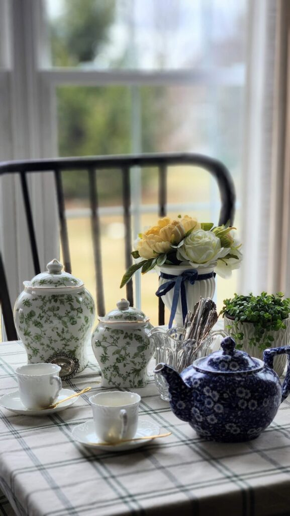 breakfast room table with tea and tea containers