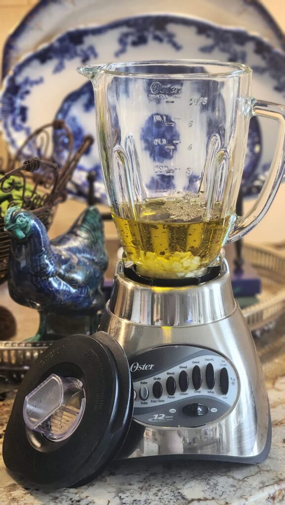 blender with italian dressing being made in it