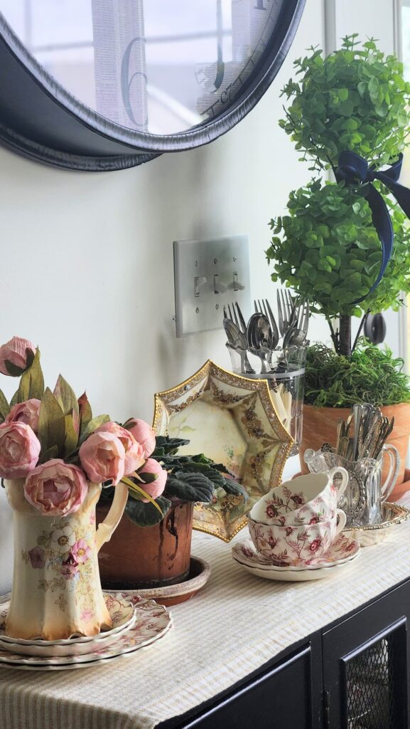 Royal Devon English pottery pitcher on sideboard with collected vintage pieces