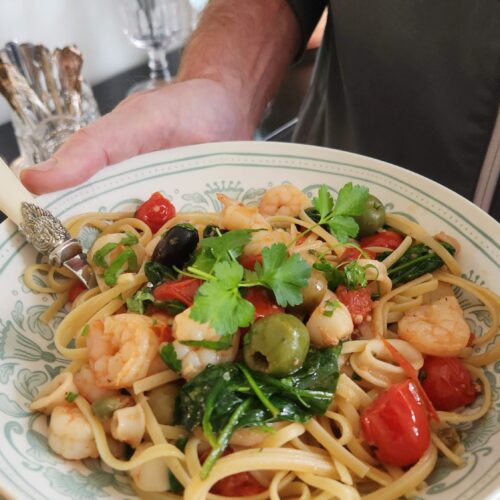 easy trader joes seafood blend recipe served over pasta