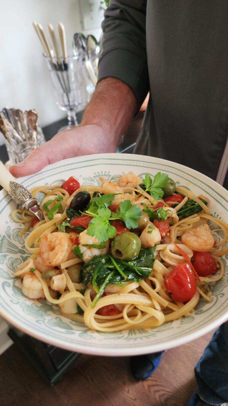 easy trader joes seafood blend recipe served over pasta