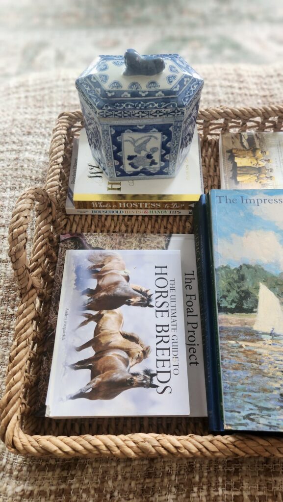 How to style a decorative tray step one blue and white ginger jar coffee table books on wicker ottoman tray