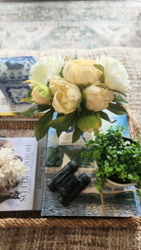 How to style a decorative tray step four small topiary candle wicker ottoman tray living room decor