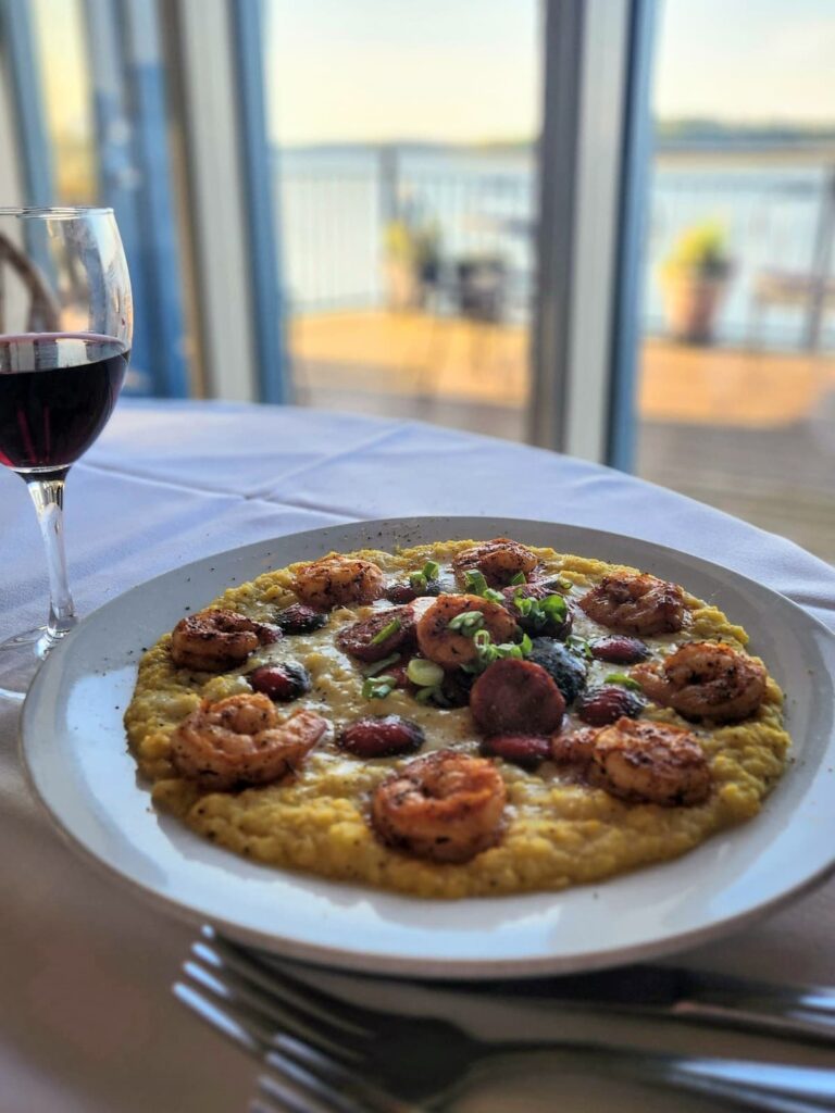 old oyster factory shrimp and grits sunset view