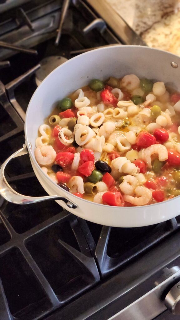 trader joes seafood blend simmering in one pan mediterranean skillet dinner